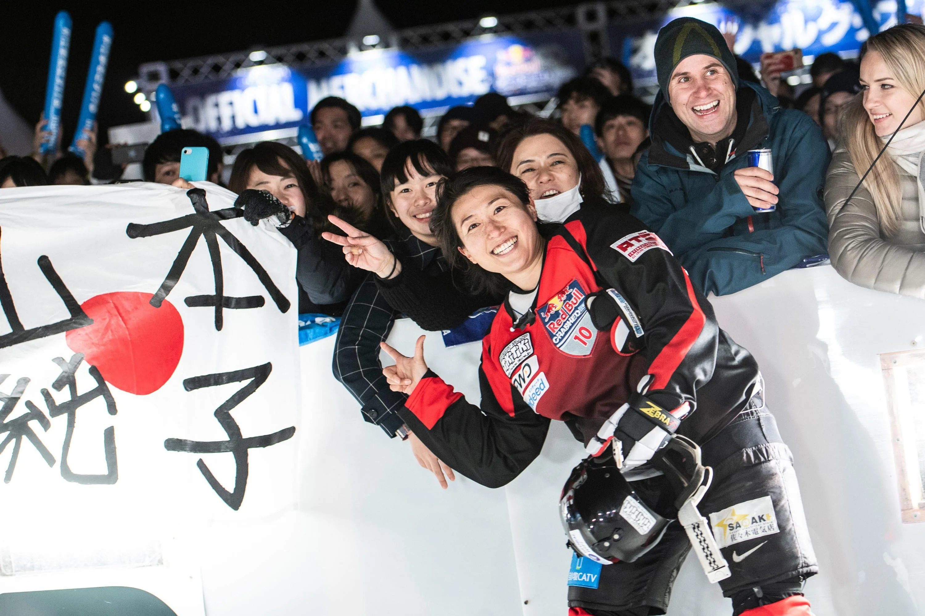 Junko Yamamoto poses for a photo with some fans. Image: Joerg Mitter / Red Bull Content Pool Junko Yamamoto poses for a photo with some fans. Image: Joerg Mitter / Red Bull Content Pool