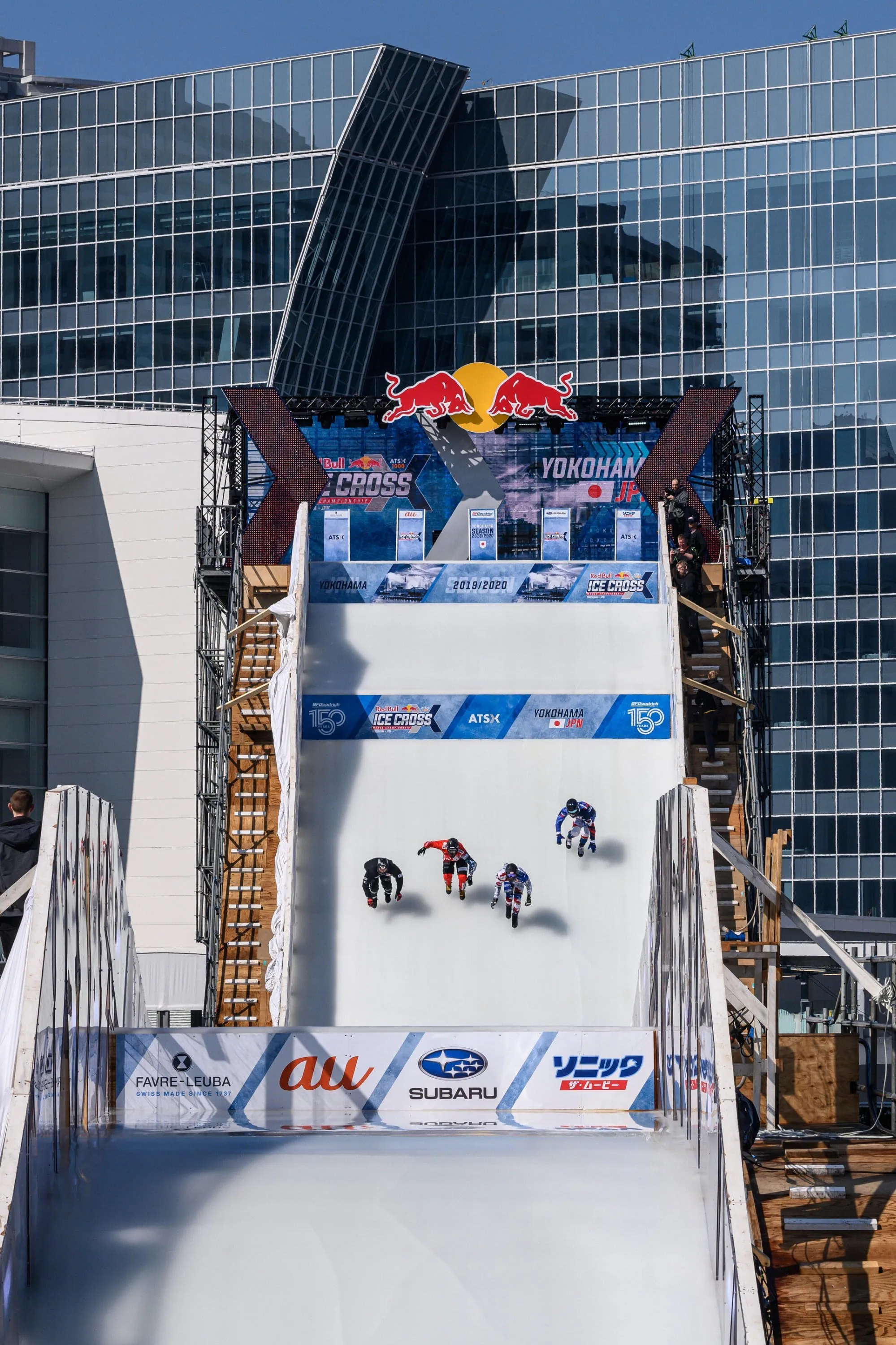 Riders drop in to the steep starting straight heading to the Reiwa Booster. Image: Joerg Mitter / Red Bull Content Pool Riders drop in to the steep starting straight heading to the Reiwa Booster. Image: Joerg Mitter / Red Bull Content Pool